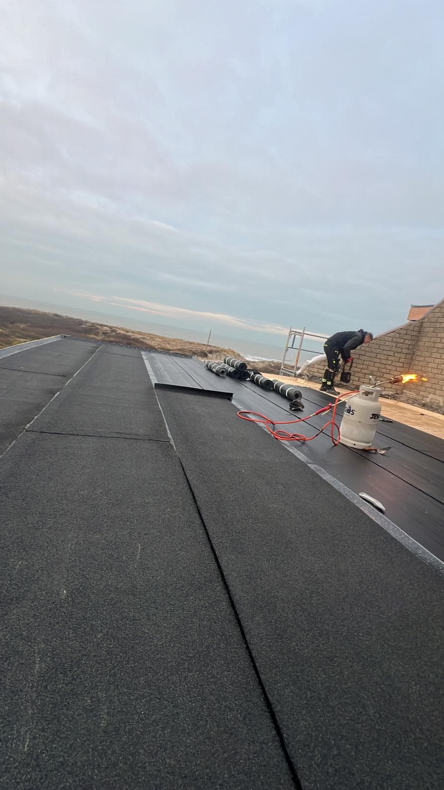Plat dak aanleg en renovatie